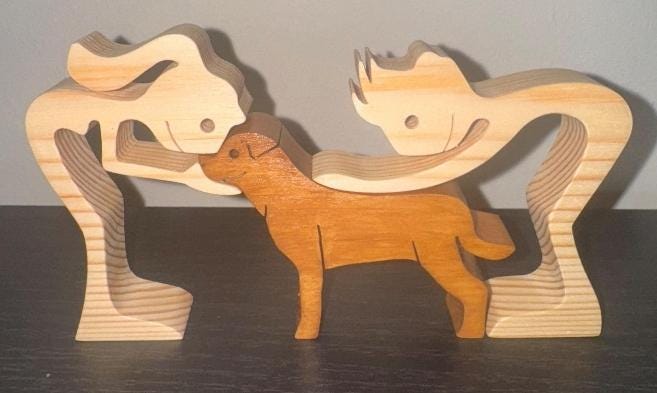 Man woman and Rottweiler wooden Sculpture, Hand made.